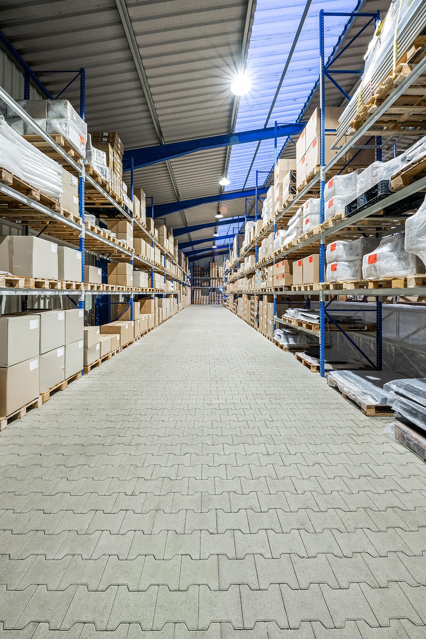 Warehouse aisle with a concrete paver floor
