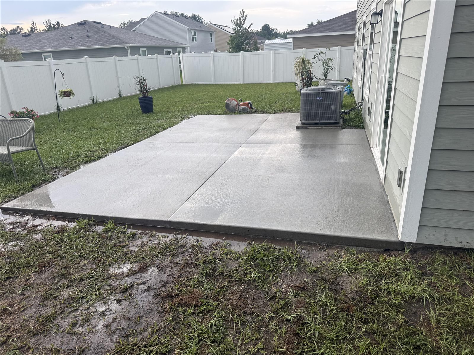 Freshly poured backyard concrete patio